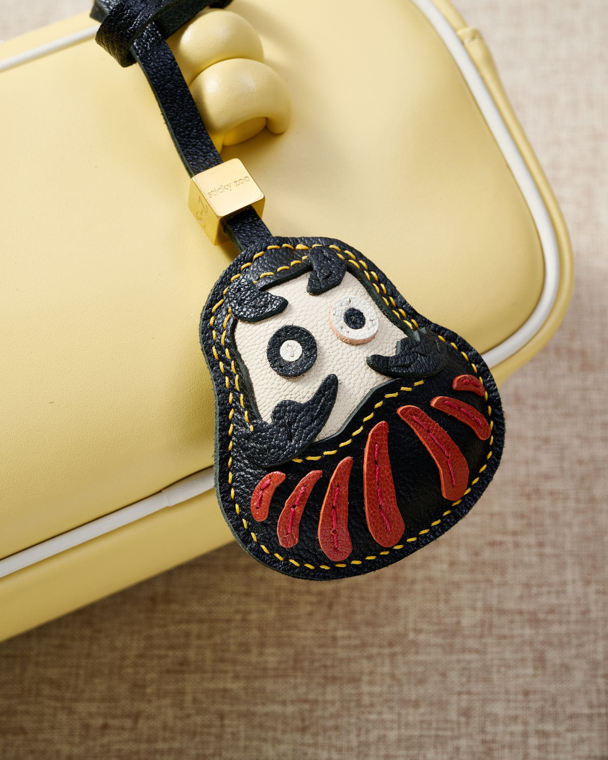 DARUMA CHARM