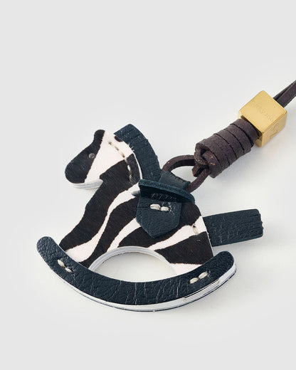 ZEBRA RIDE STACK CHARM